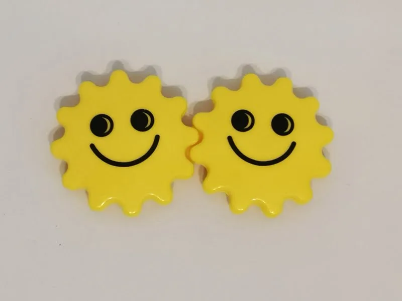 Hochet soleil siamois Ambi Toys